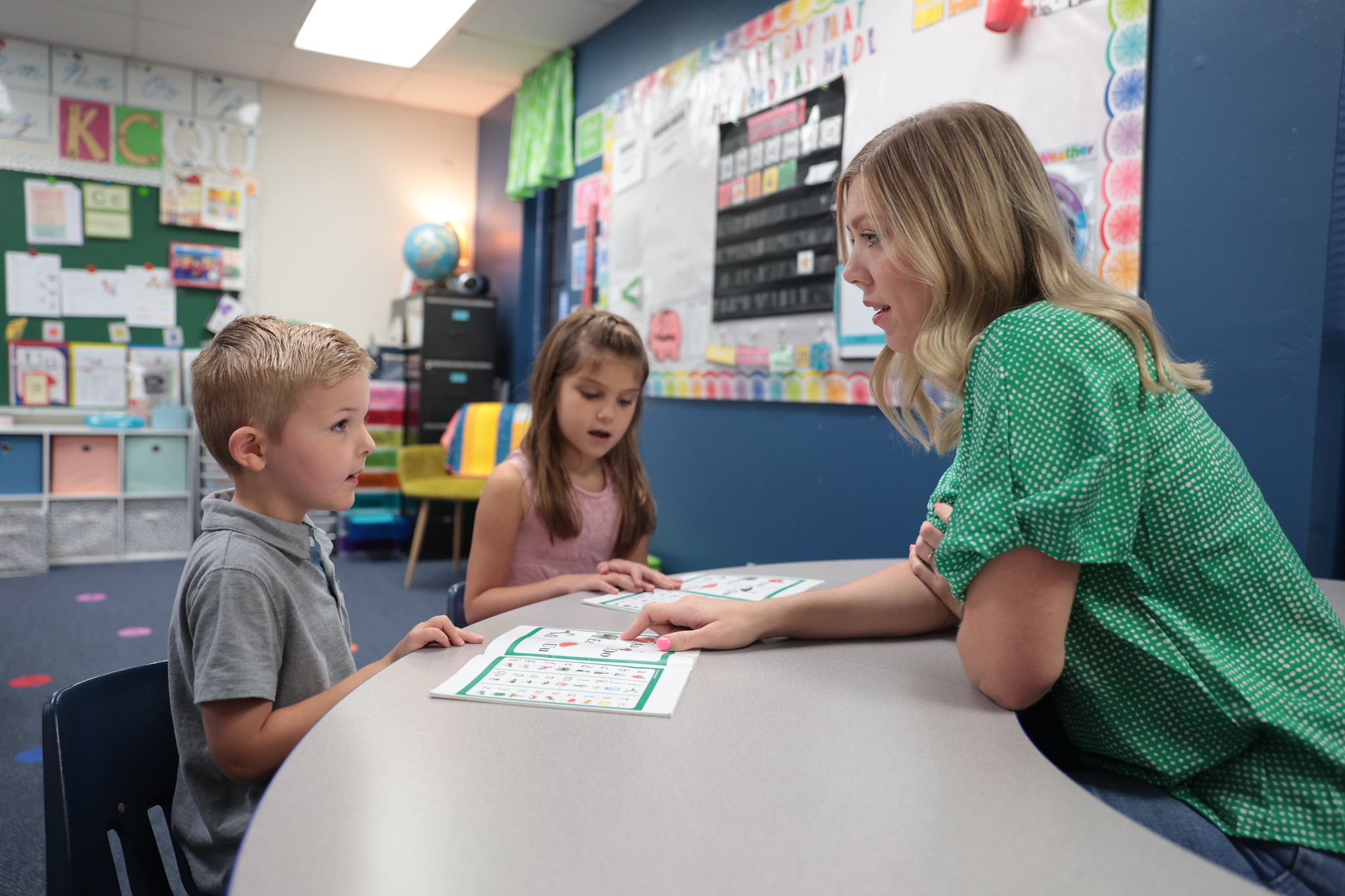 A young boy and a girl in costume participating in a play